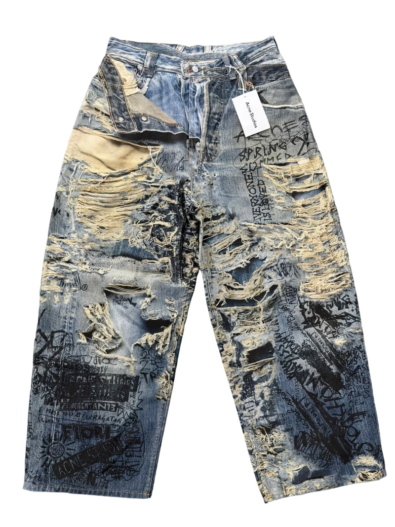 ACNE STUDIOS TORN SCRIBBLE JEANS